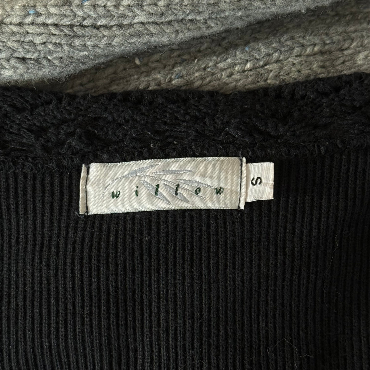 Willow’s dainty black sweater
