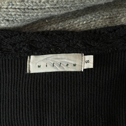 Willow’s dainty black sweater