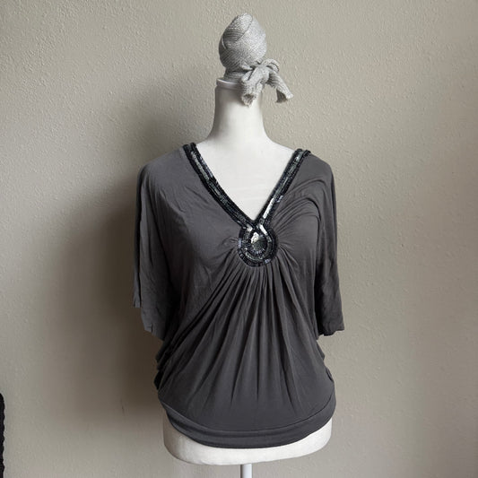 Gray beaded batwing top