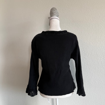 Willow’s dainty black sweater