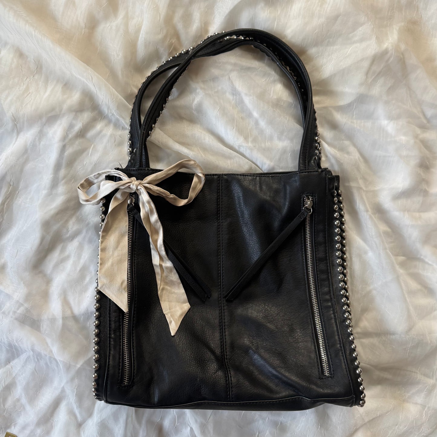 Studded zipper shoulder bag