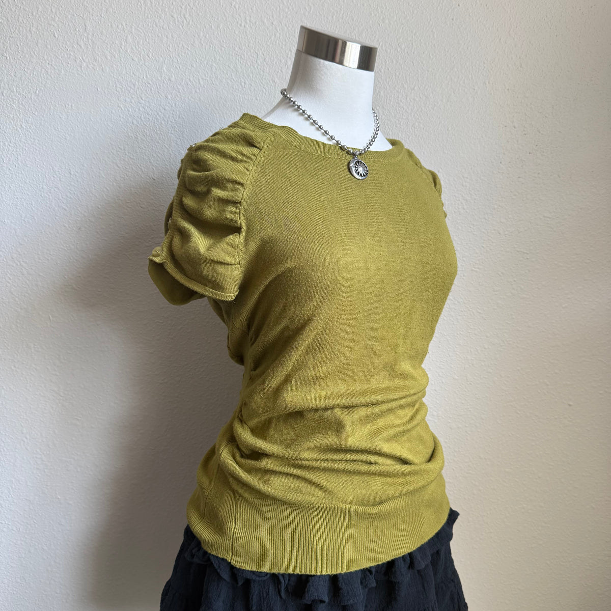 Olivia’s green office top