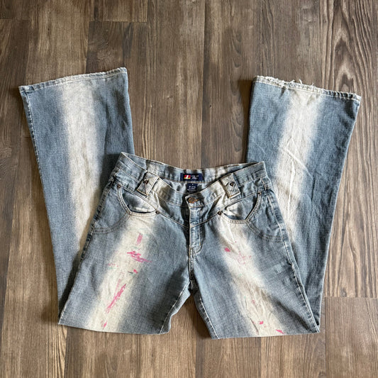Erica’s faded mid rise jeans