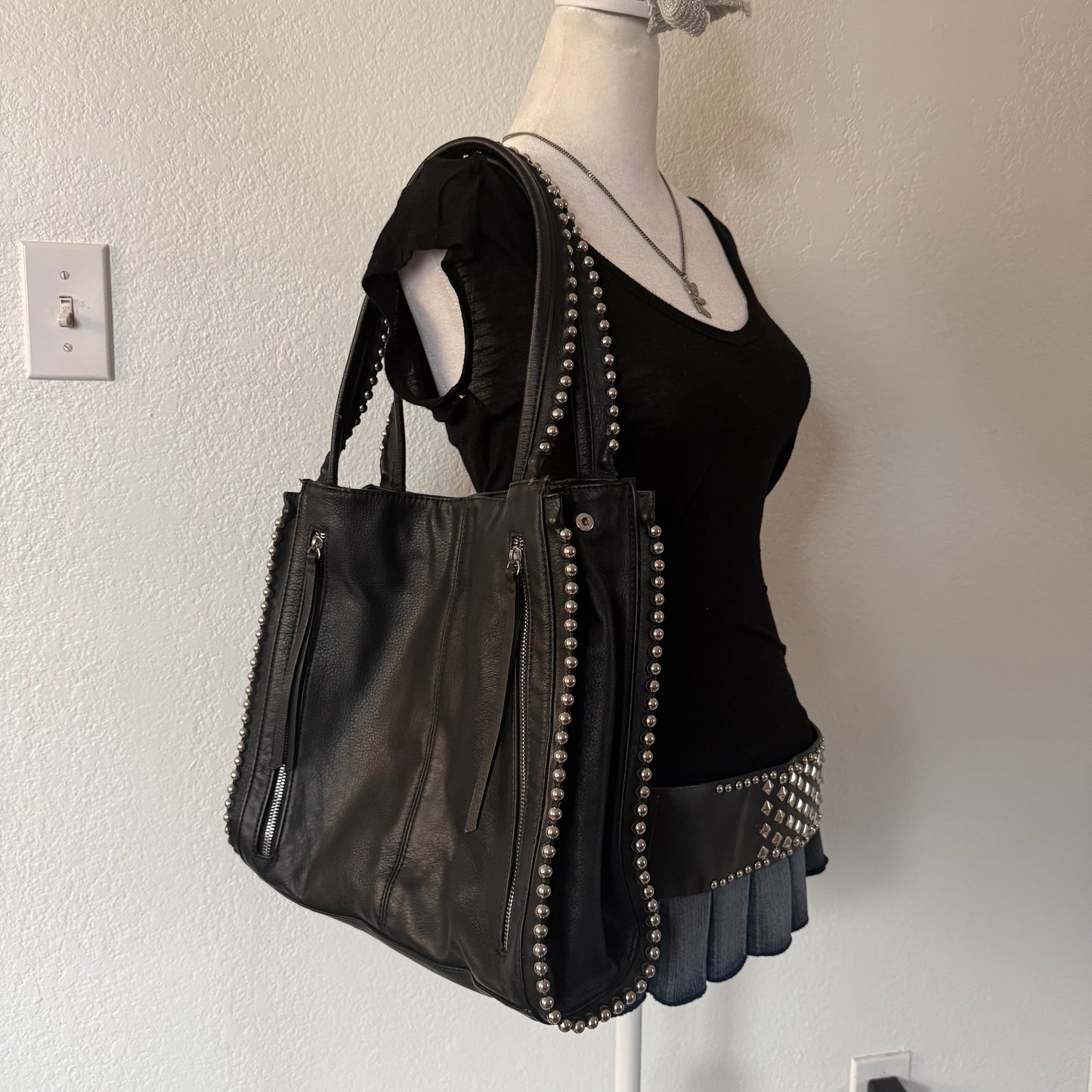Studded zipper shoulder bag