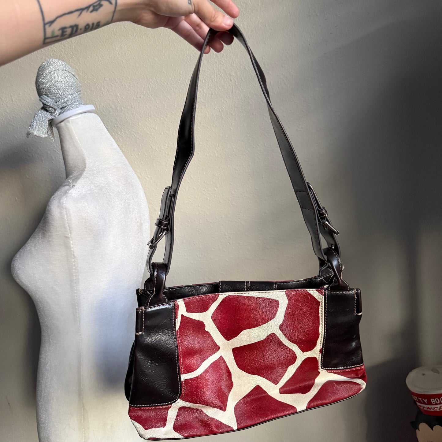 Giraffe print shoulder bag