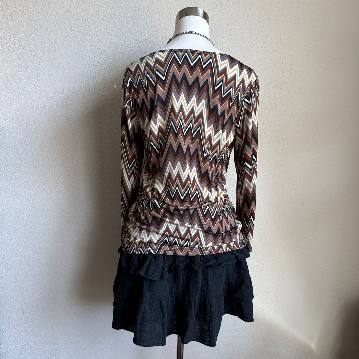 Kelly’s abstract printed top