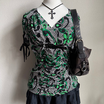 Eve’s flower patterned office top
