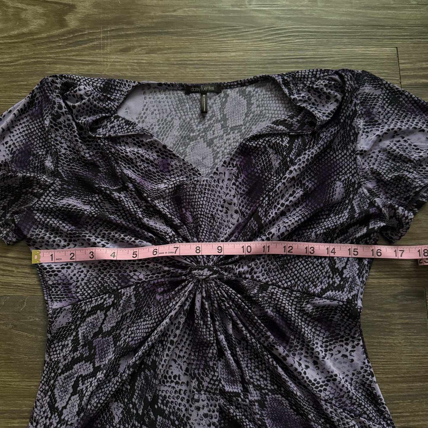 Purple snakeskin ruffle top