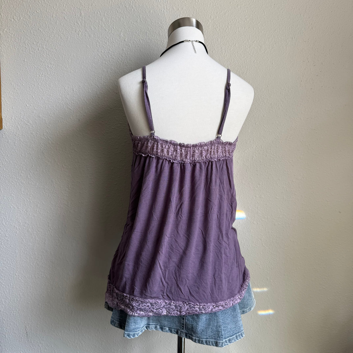Flora’s purple tank top