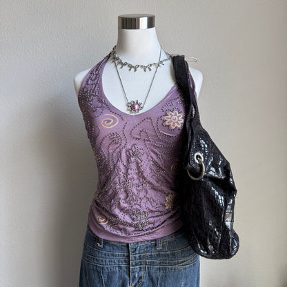 Chloe’s black snakeskin bag