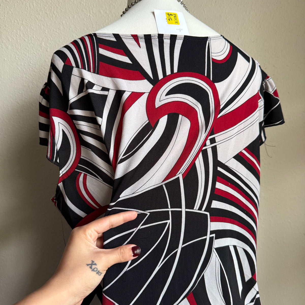 Stella’s patterned top