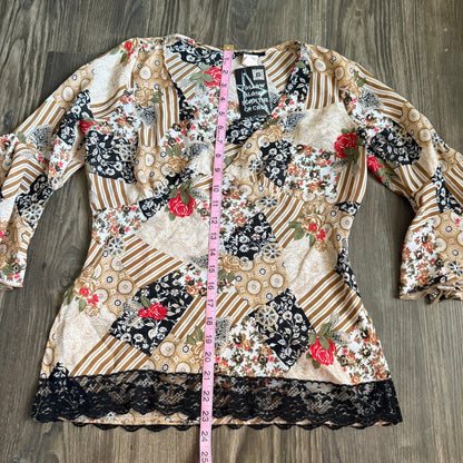 Misty’s boho flared sleeve top
