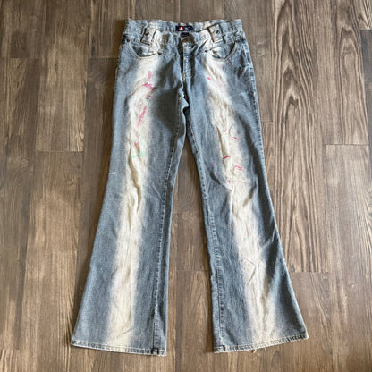 Erica’s faded mid rise jeans