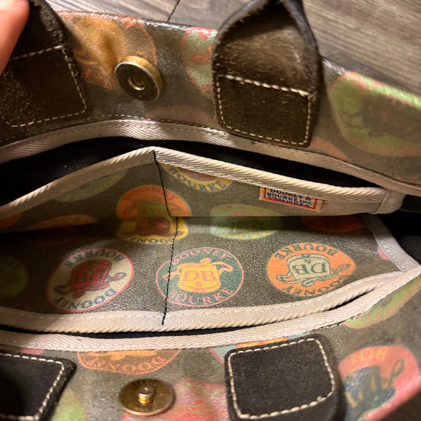 Dooney & Bourke circle logo handbag