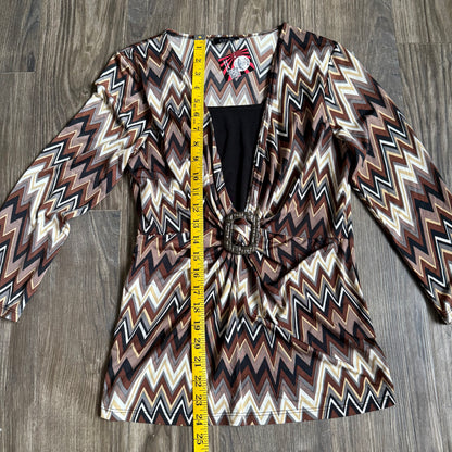 Kelly’s abstract printed top