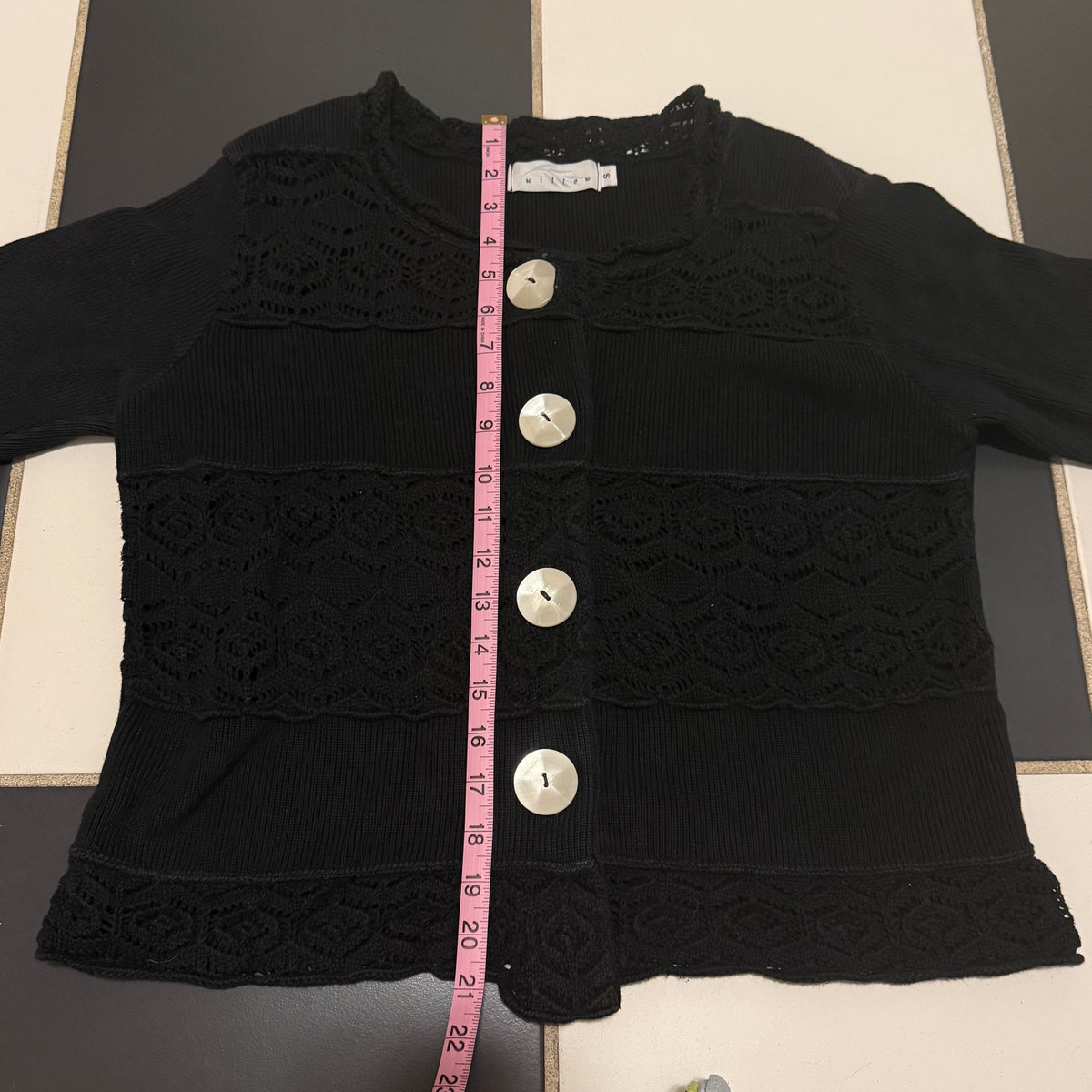 Willow’s dainty black sweater
