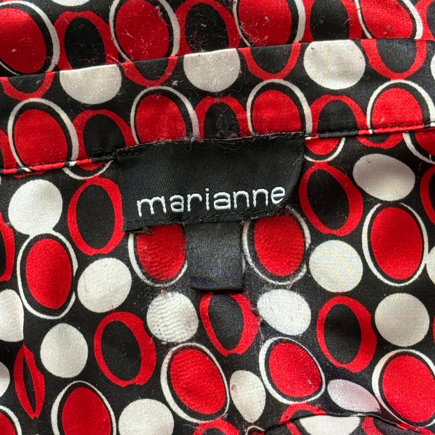 Patterned circle button up top