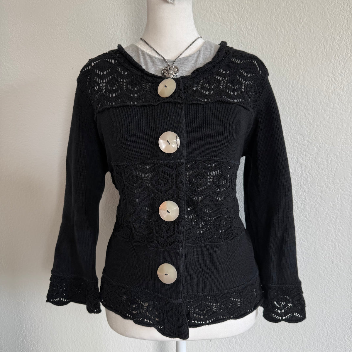 Willow’s dainty black sweater