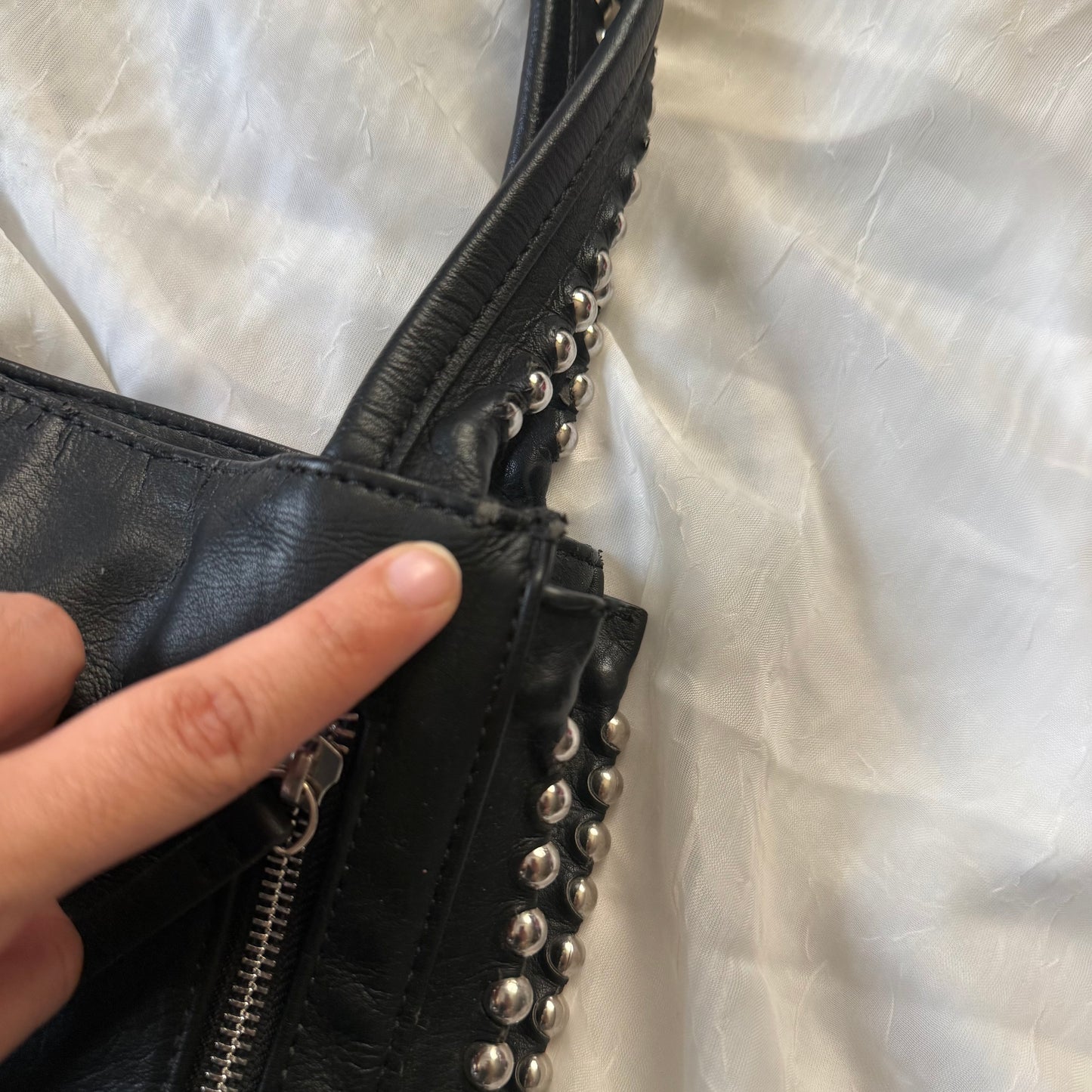 Studded zipper shoulder bag