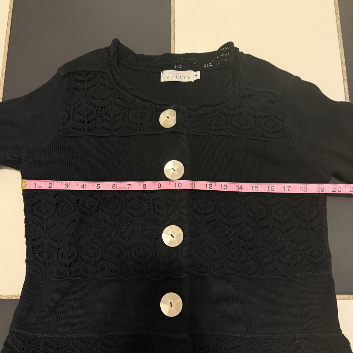 Willow’s dainty black sweater