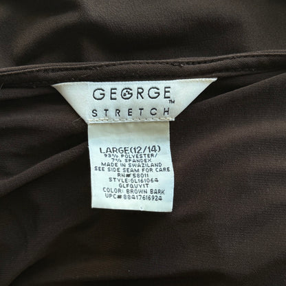 April’s brown sleeved top