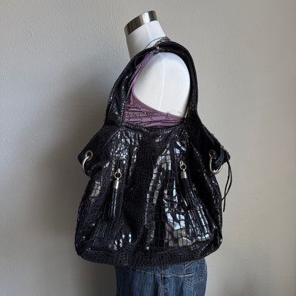 Chloe’s black snakeskin bag