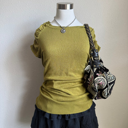 Olivia’s green office top