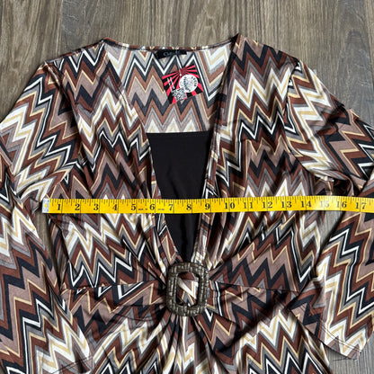 Kelly’s abstract printed top