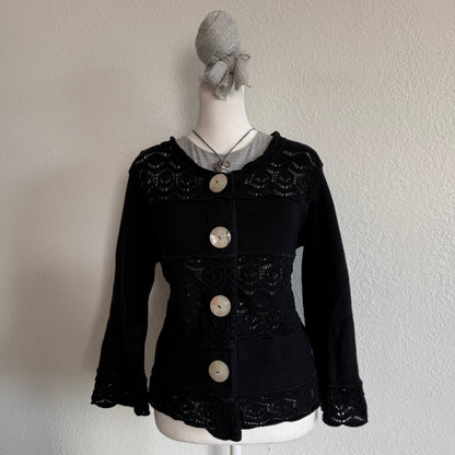 Willow’s dainty black sweater