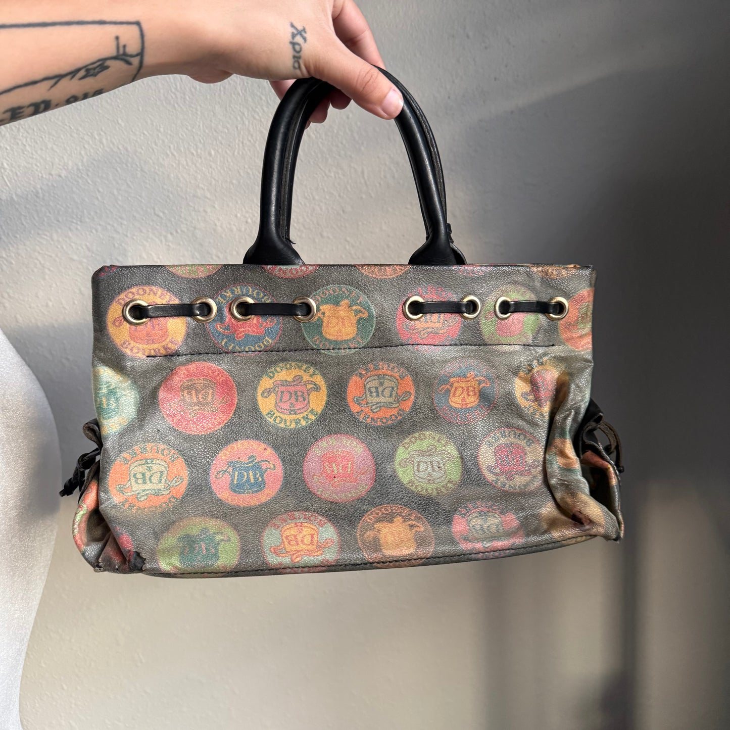 Dooney & Bourke circle logo handbag