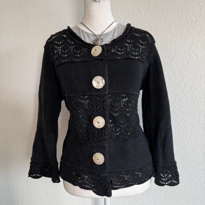 Willow’s dainty black sweater