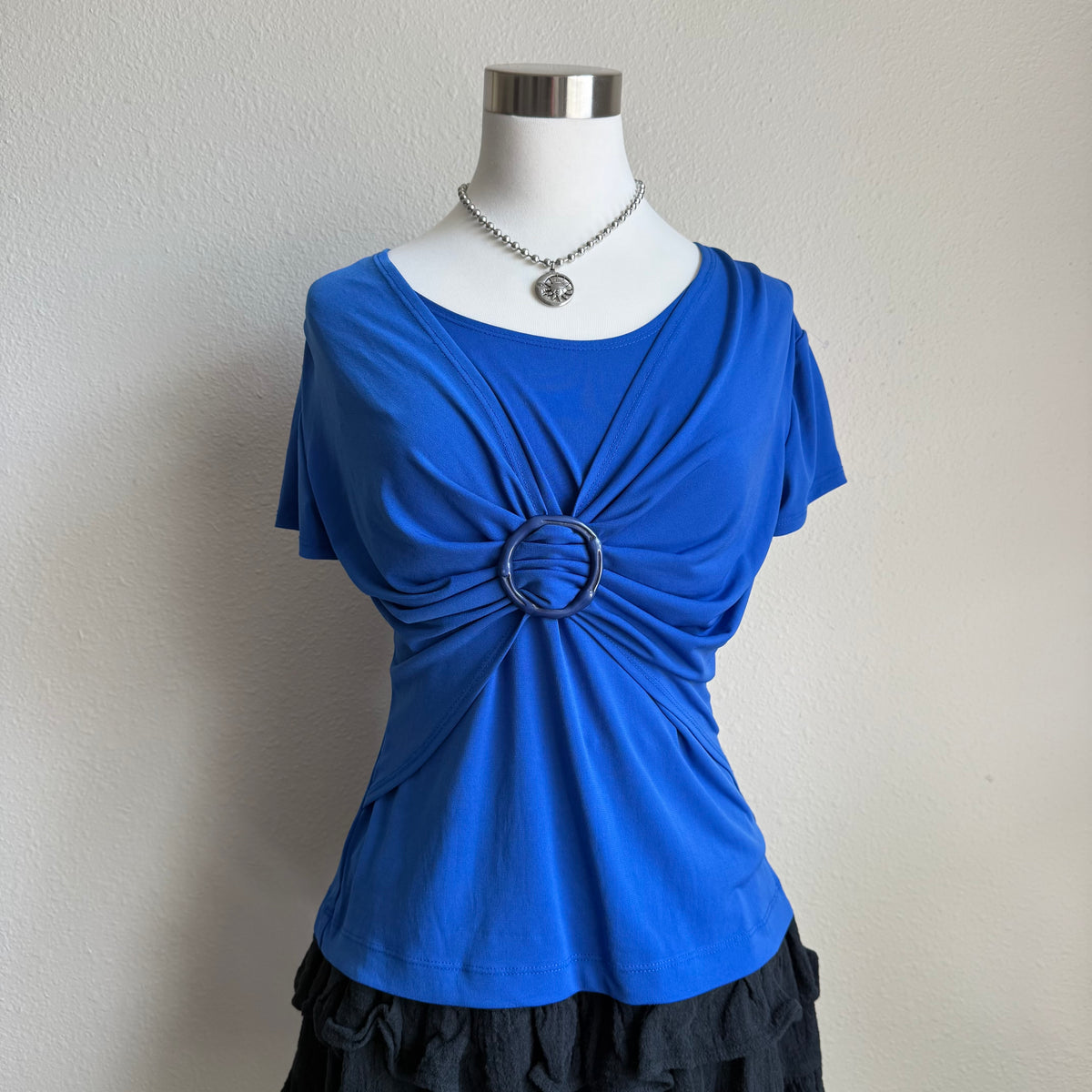 Molly’s blue circle top