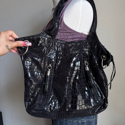Chloe’s black snakeskin bag