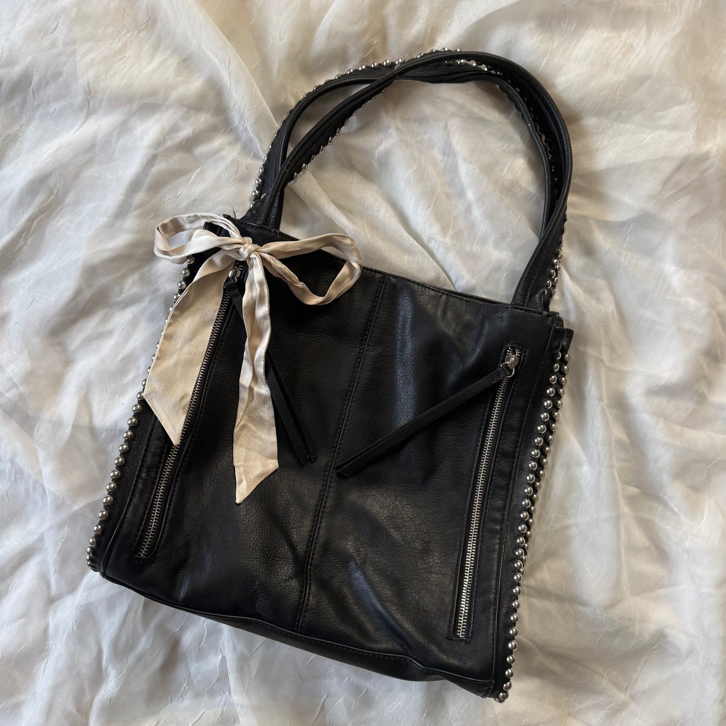 Studded zipper shoulder bag