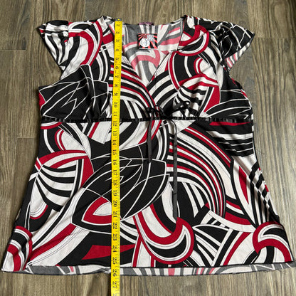 Stella’s patterned top