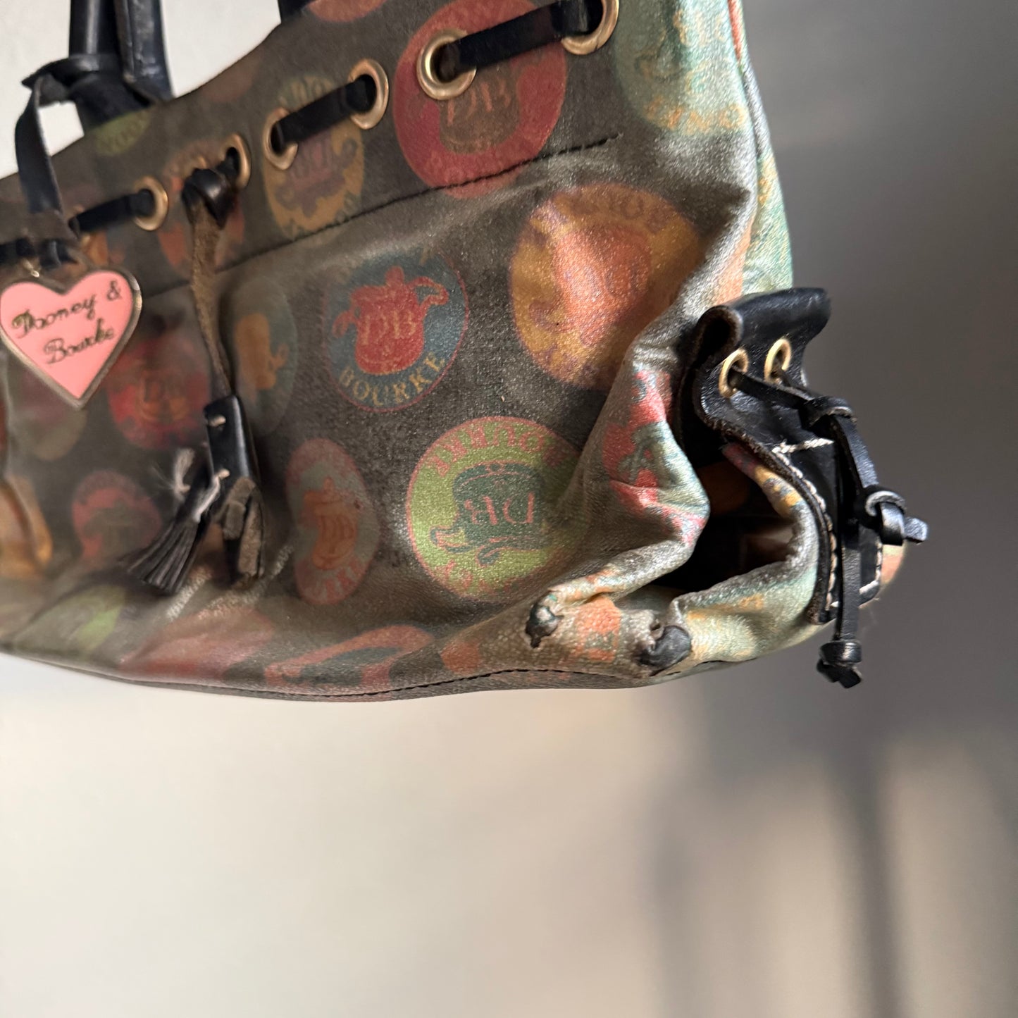 Dooney & Bourke circle logo handbag