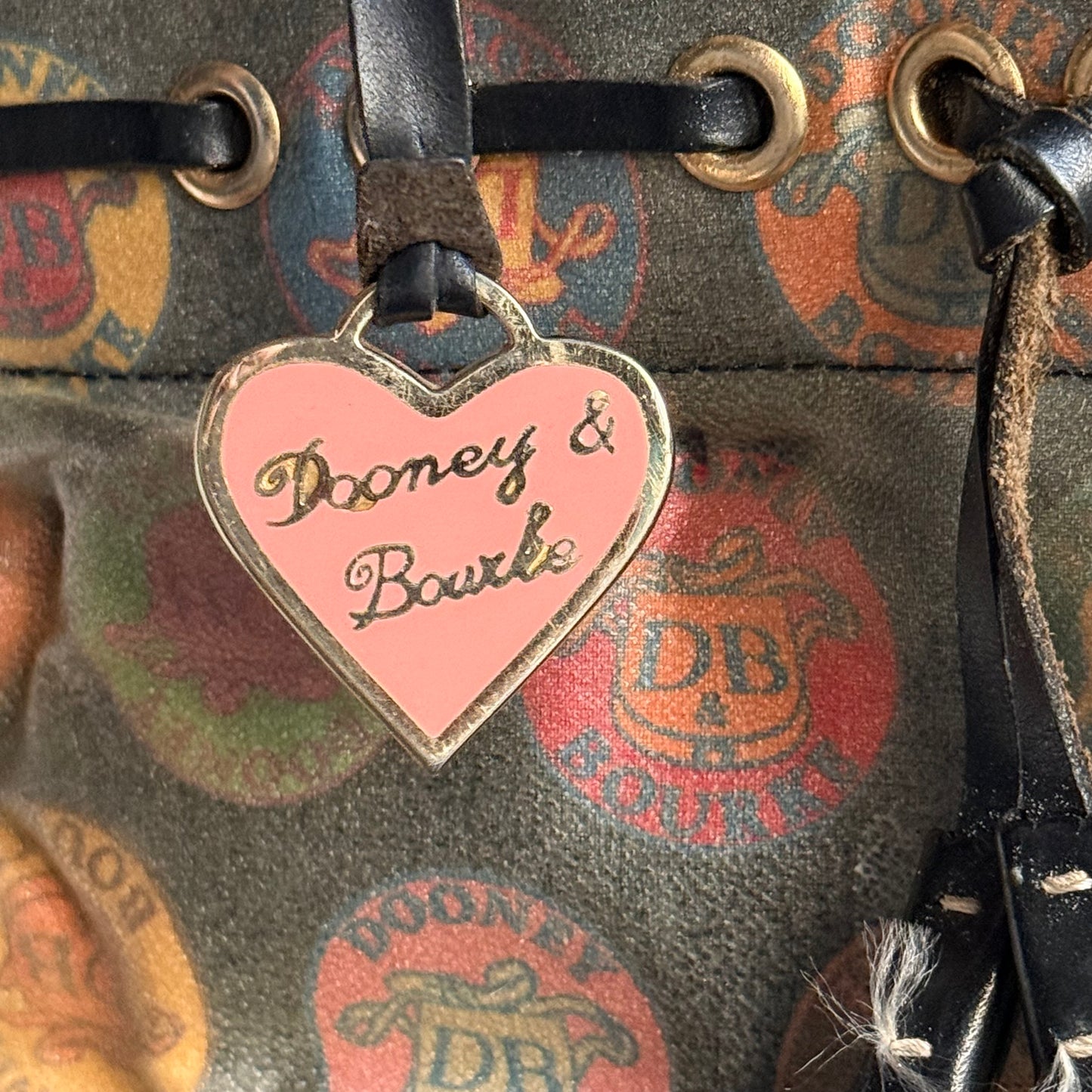 Dooney & Bourke circle logo handbag
