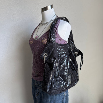 Chloe’s black snakeskin bag